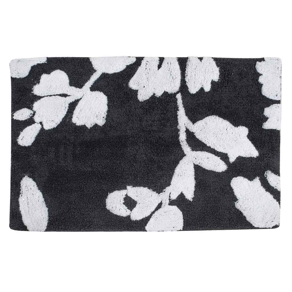 Alfombra de baño negra con detalles de flores blancas